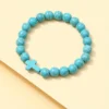 Bracelet Croix en Perles